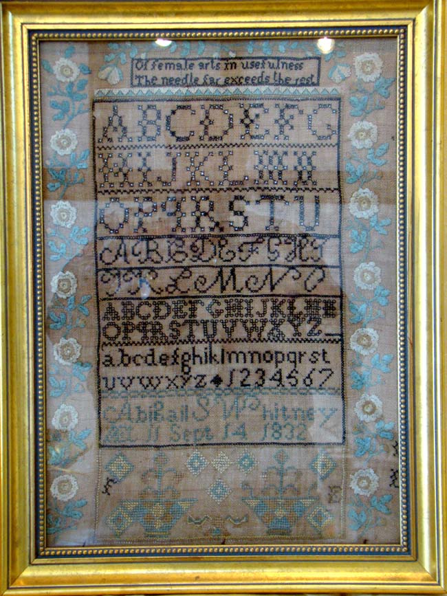 A fine Schoolgirl needlework sampler by Abigail S. Whitney of Limington, Maine, aged 11, September 14, 1832.